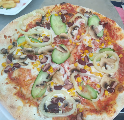 Opinii despre Forum Bistro -étterem,pizza,hamburger, street food, hot-dog în Karcag - Vendéglátás